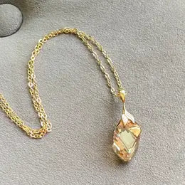 GOLD SHADOW CUBIST NECKLACE